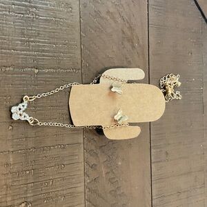 Gold Butterfly Necklace with Flower Pendant